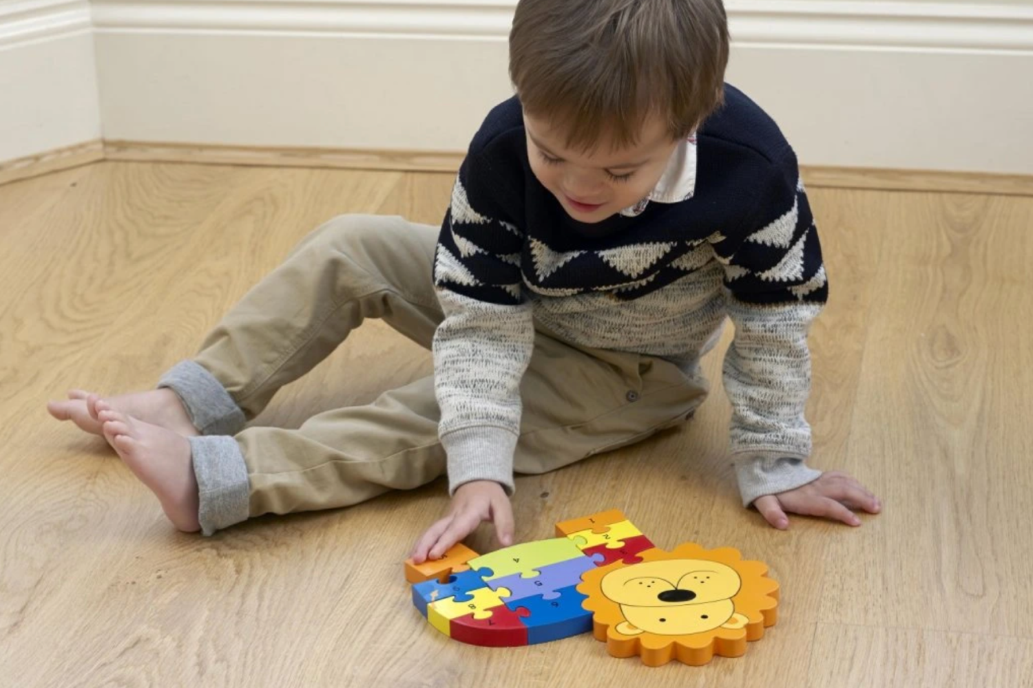 Dřevěné puzzle lev